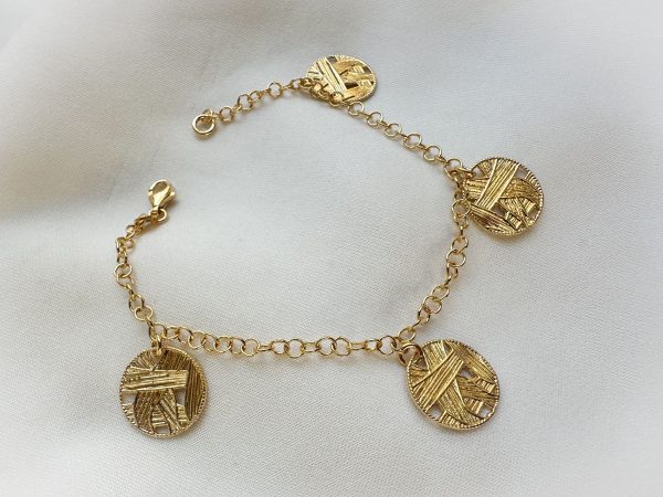 Pulsera con dijes redondos