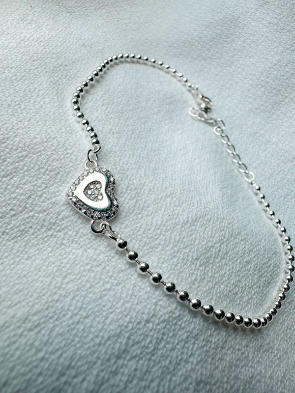 Pulsera de corazón y bolitas